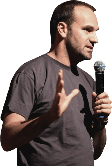 Mark Shuttleworth speaking into a microphone